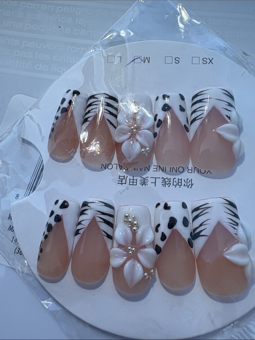 Elegant Nude and White Press-On Nails with Black Accent Design